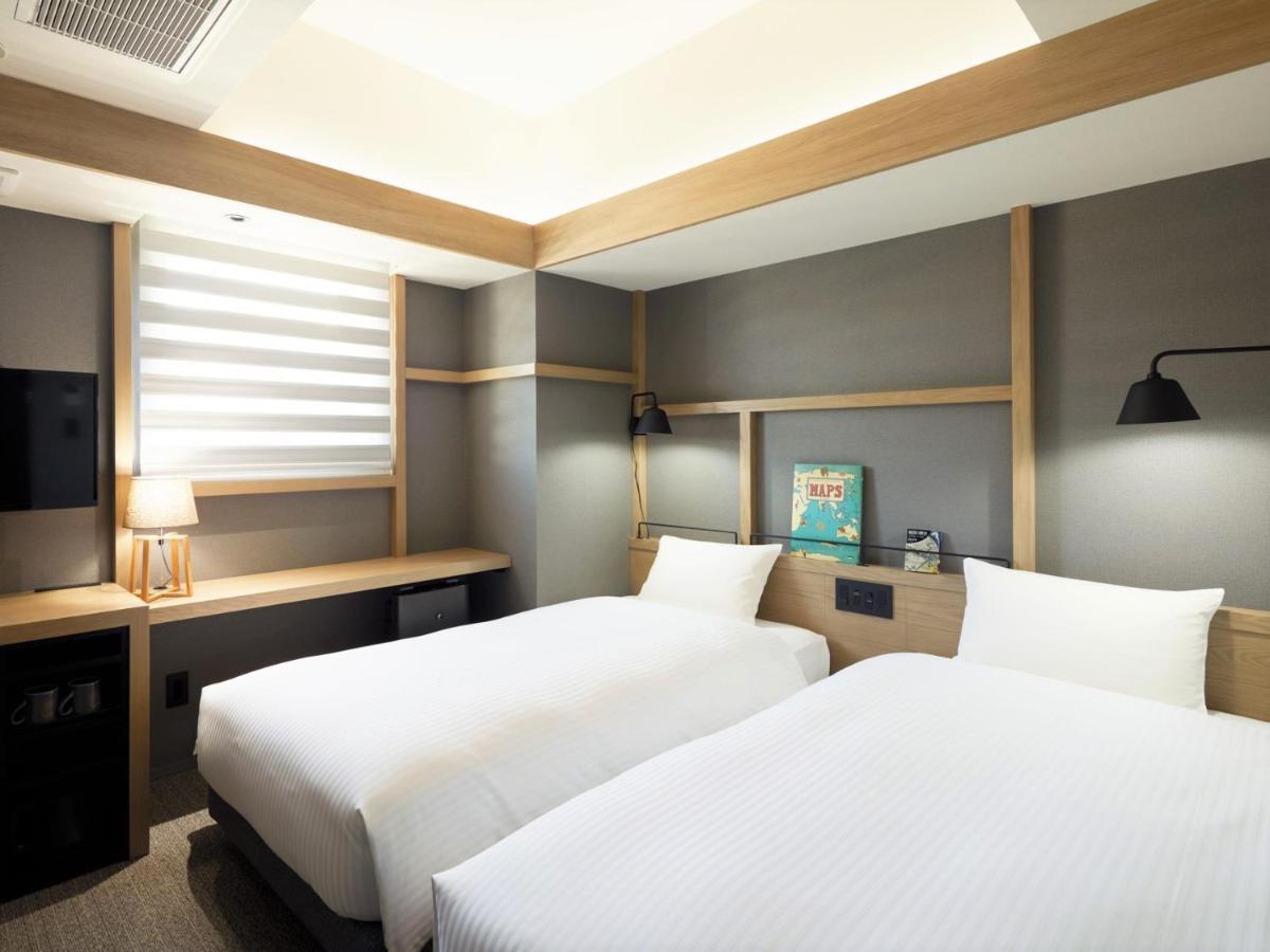 Lamp Light Books Hotel Sapporo Exterior foto